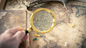 Magnifying glass searches over the United States