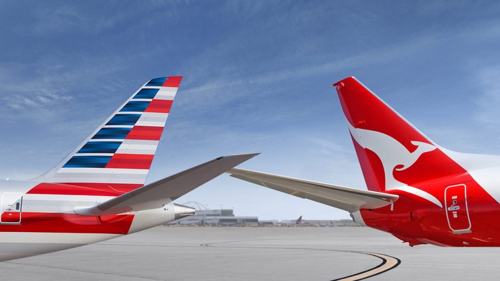 American Airlines and Qantas airplane tails together