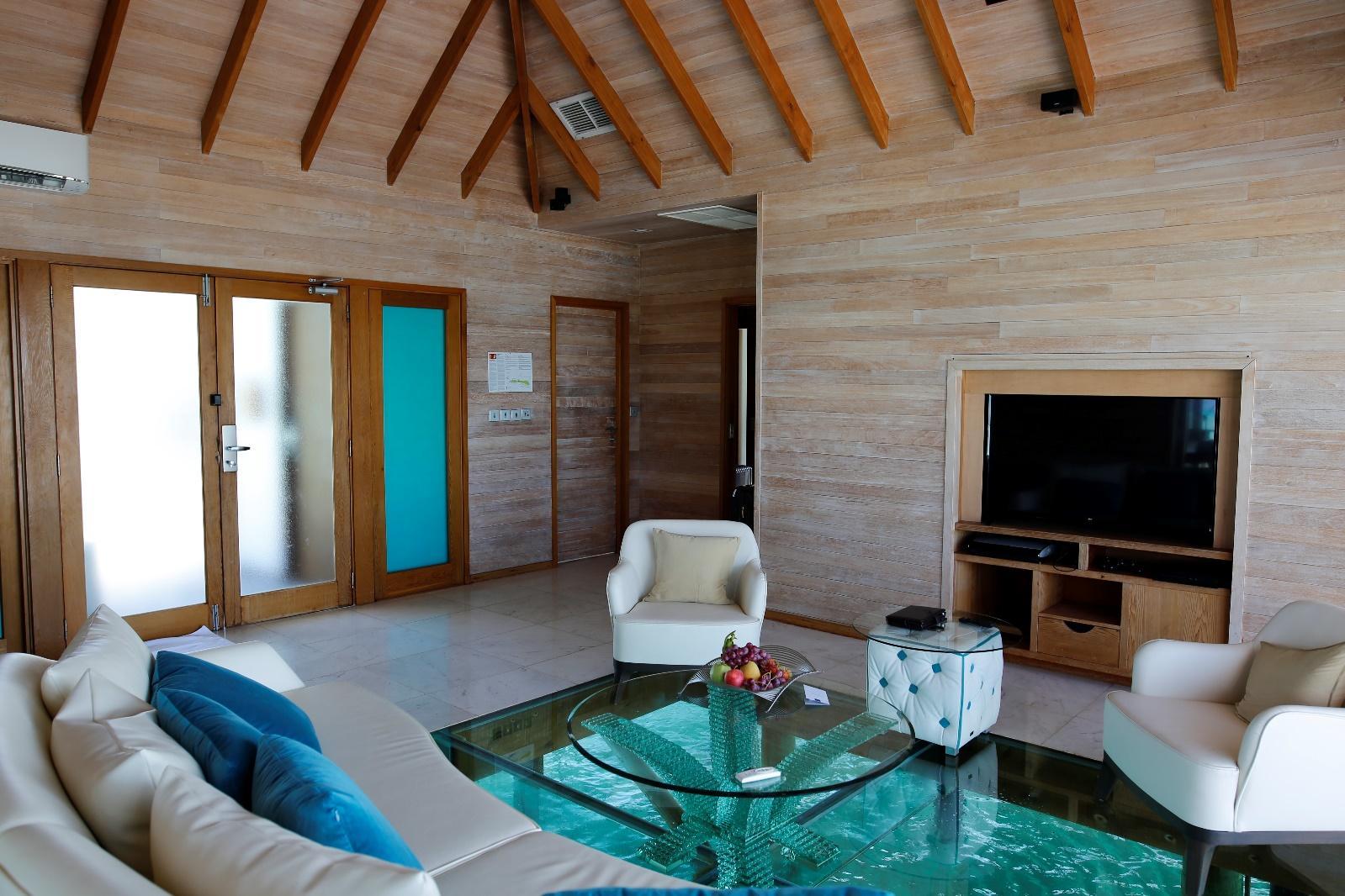 Conrad Rangali Maldives Sunset Water Villa Living Area
