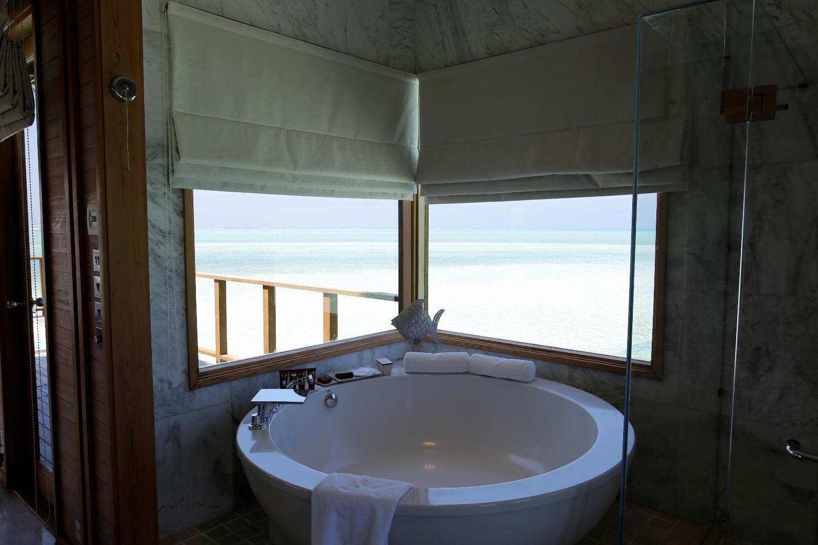 Conrad Rangali Maldives Sunset Water Villa bathtub at bathroom 1