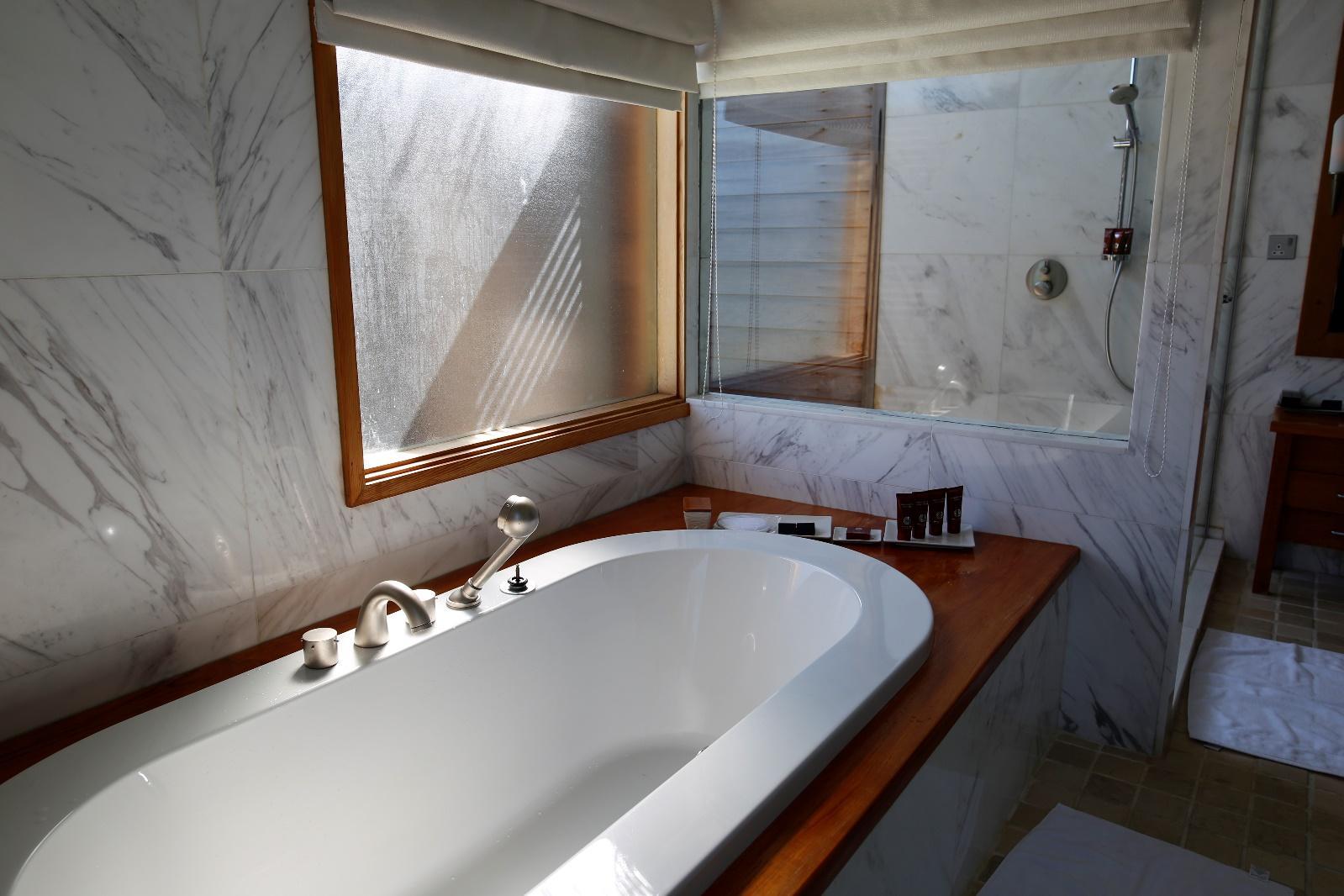 Conrad Rangali Maldives Sunset Water Villa bathtub at bathroom 2