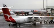Qantas Embraer 190 and Jetstar Airbus A320 on tarmac