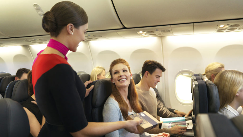 Passengers travelling in Qantas Economy cabin