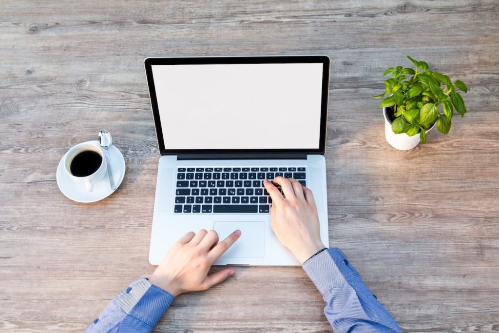 Man infront of laptop