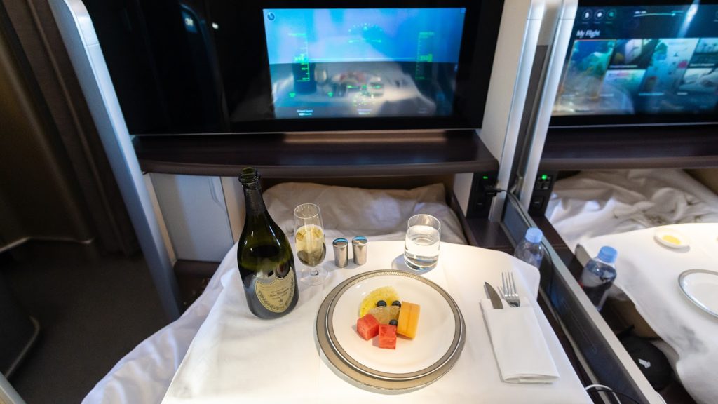 Singapore Airlines First Class food- Dom Perignon and fresh fruits