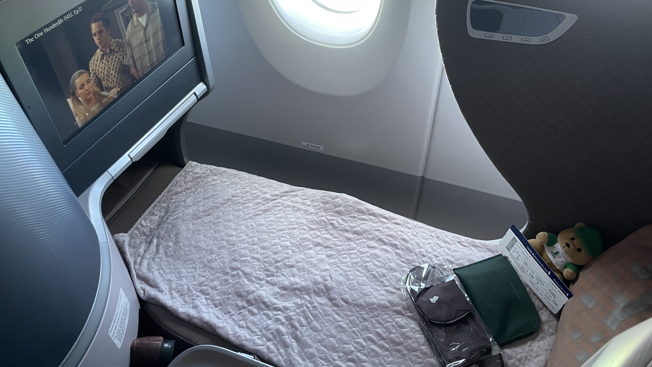 Singapore Airlines A350 Business Class seat in lie-flat position