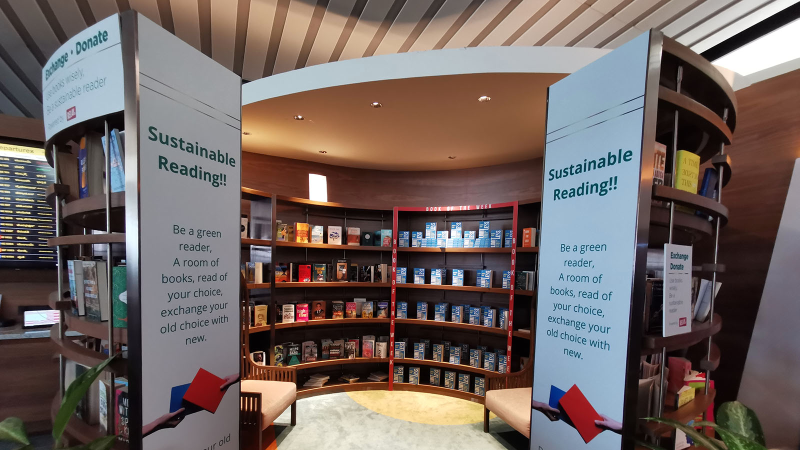 The lounge used by Air India A320neo Business Class passengers in Bengaluru has a library