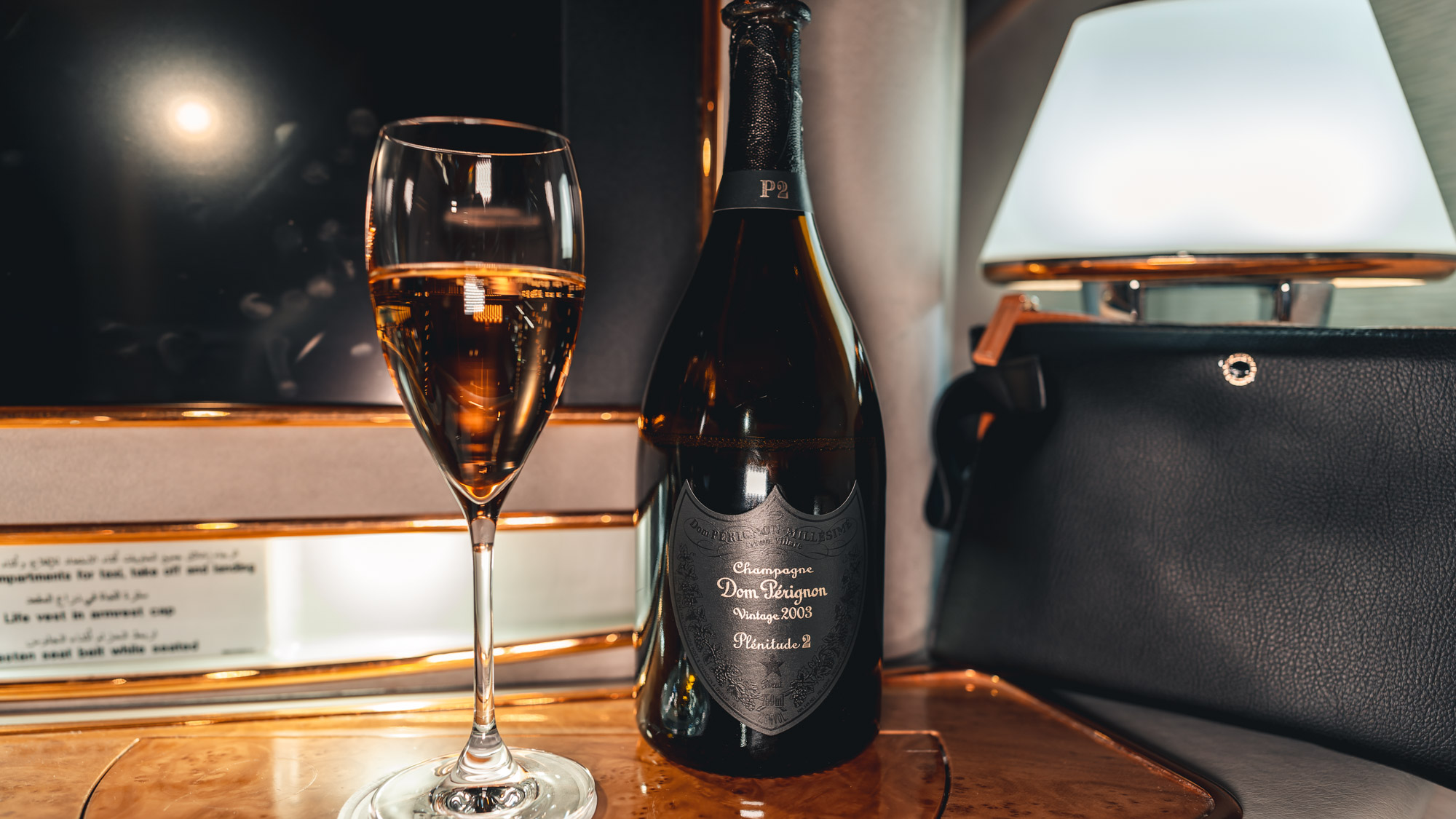 Emirates Boeing 777 First class Champagne and bottle