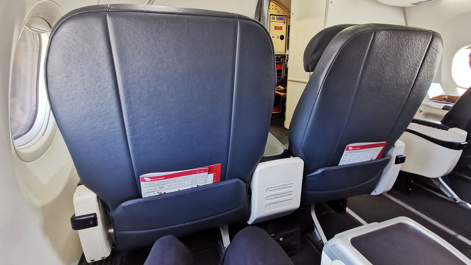Business Class seatback in row 2 aboard Virgin Australia's Boeing 737