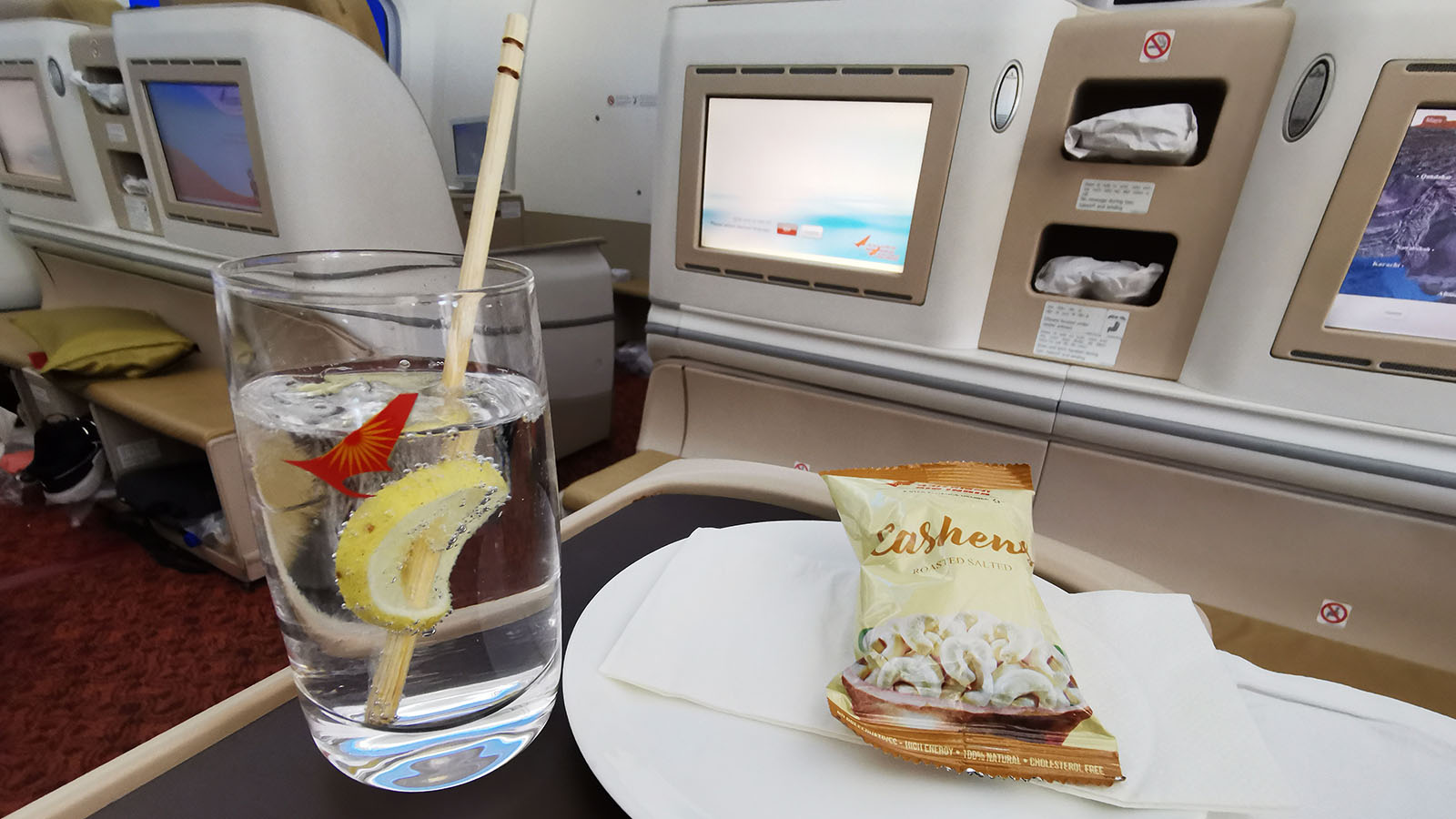 Gin and tonic with cashews in Air India's Boeing 787 Business Class