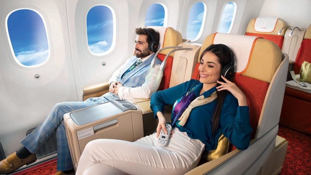 Passengers relaxing in Air India Boeing 787 Business Class