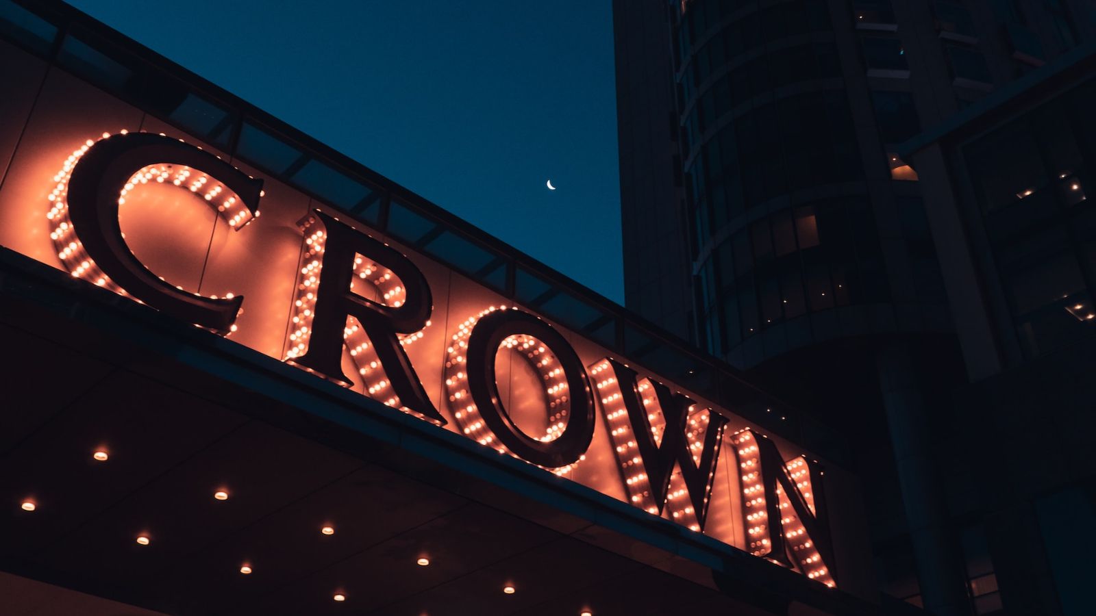 Crown Casino sign in Melbourne, Australia - Point Hacks