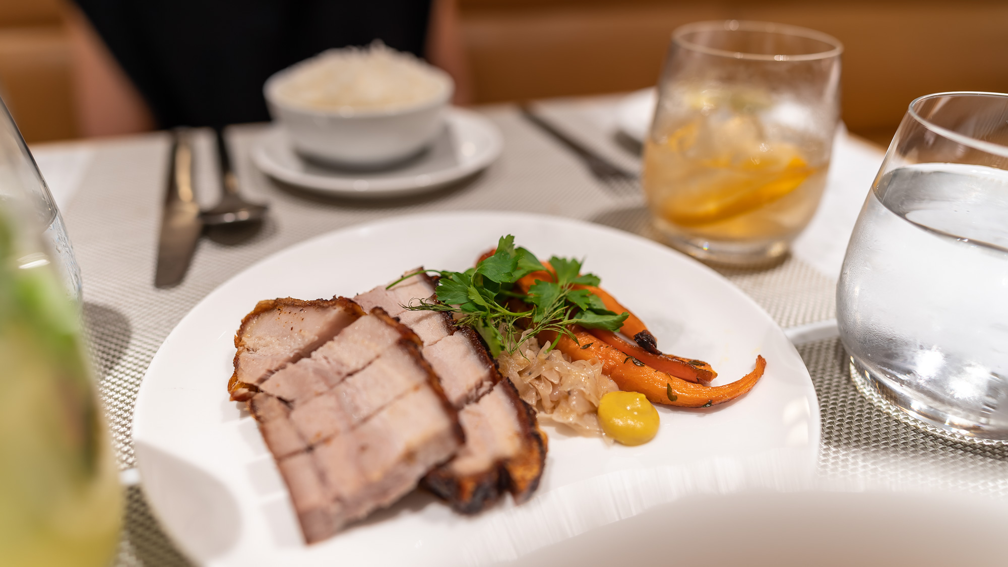 Qantas Singapore First Lounge dining roast pork