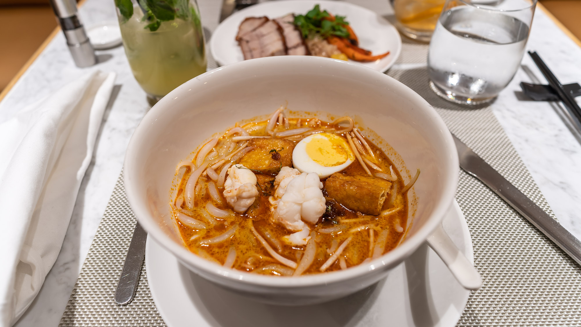 Qantas Singapore First Lounge dining laksa