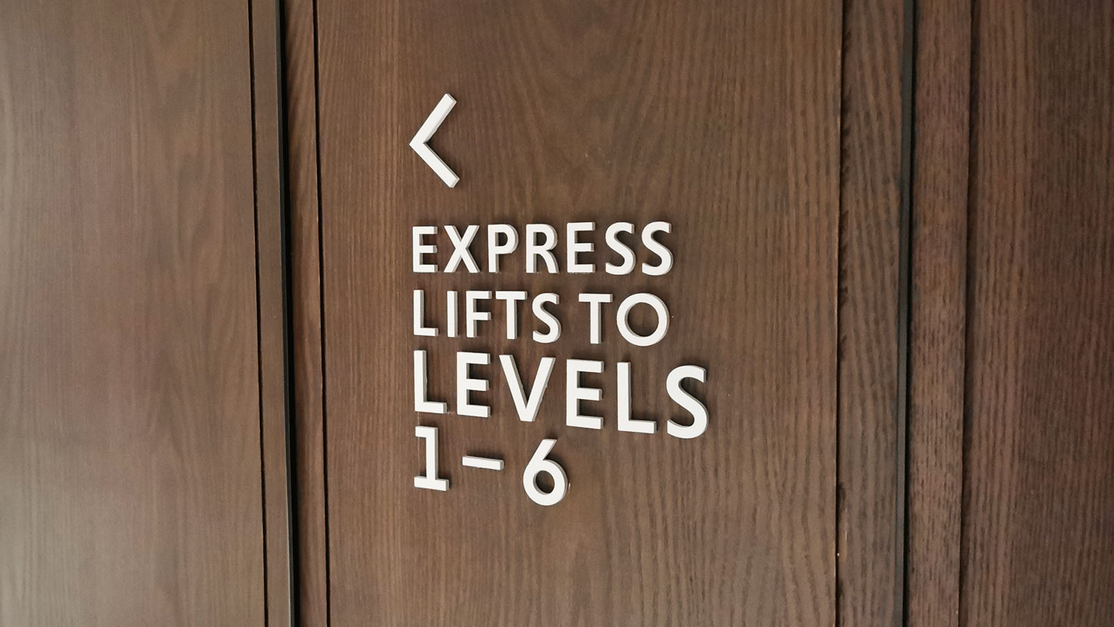 Lift sign for floors 1-6 at Hilton Singapore Orchard hotel