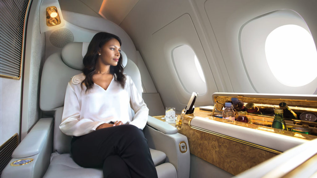 Passenger sitting in Emirates First Class suite