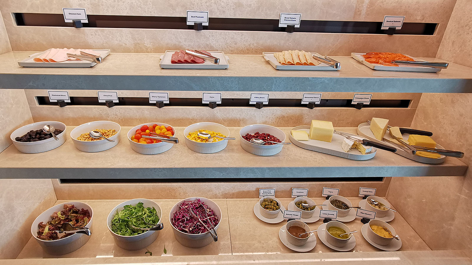 Breakfast meats, salads and cheeses at Hilton Singapore Orchard Executive Lounge