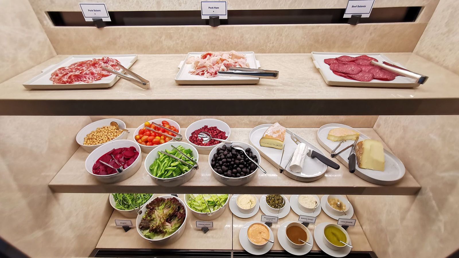 Meats, salads, cheeses at Hilton Singapore Orchard Executive Lounge