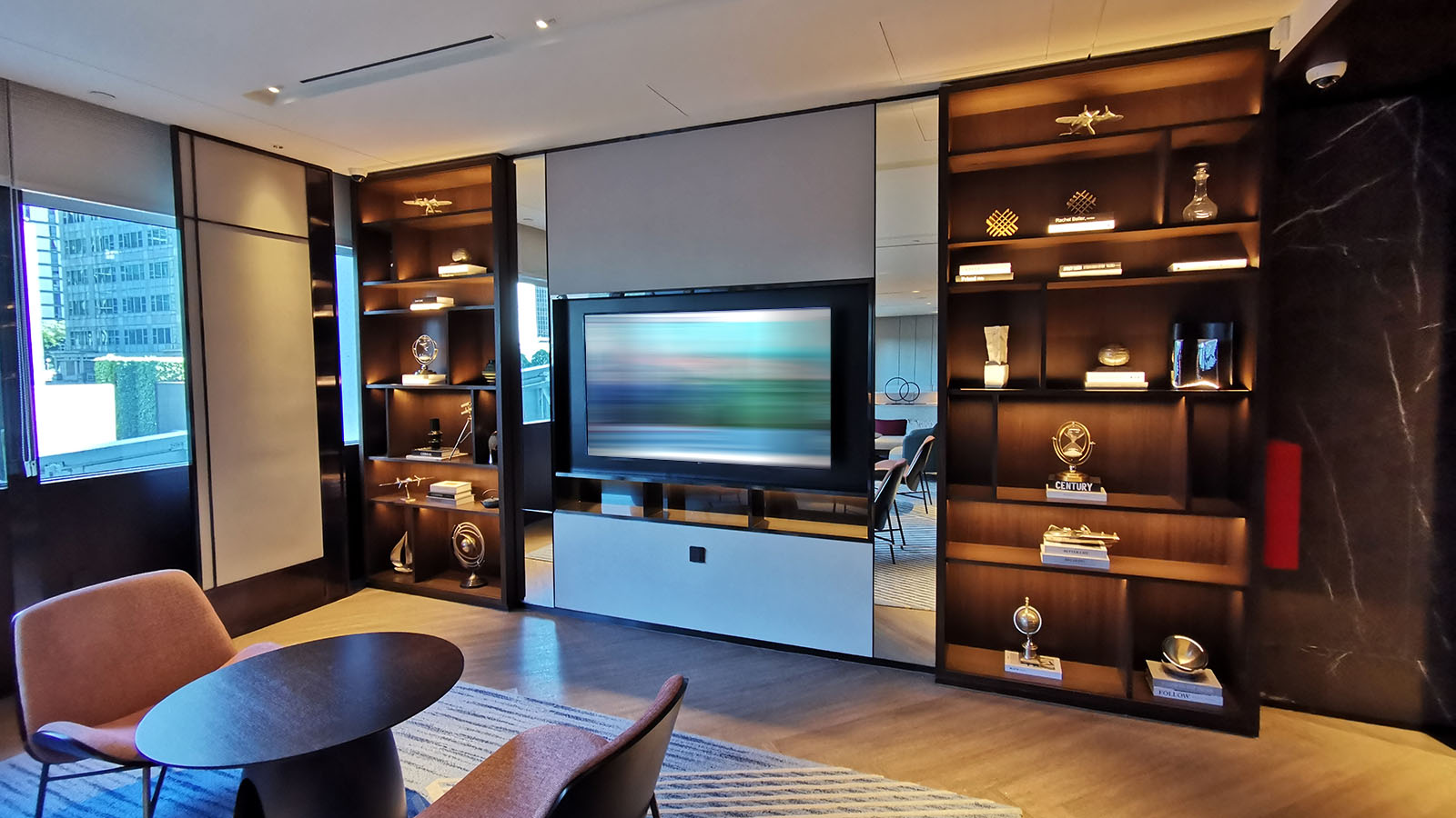 Room with a TV at Hilton Singapore Orchard Executive Lounge