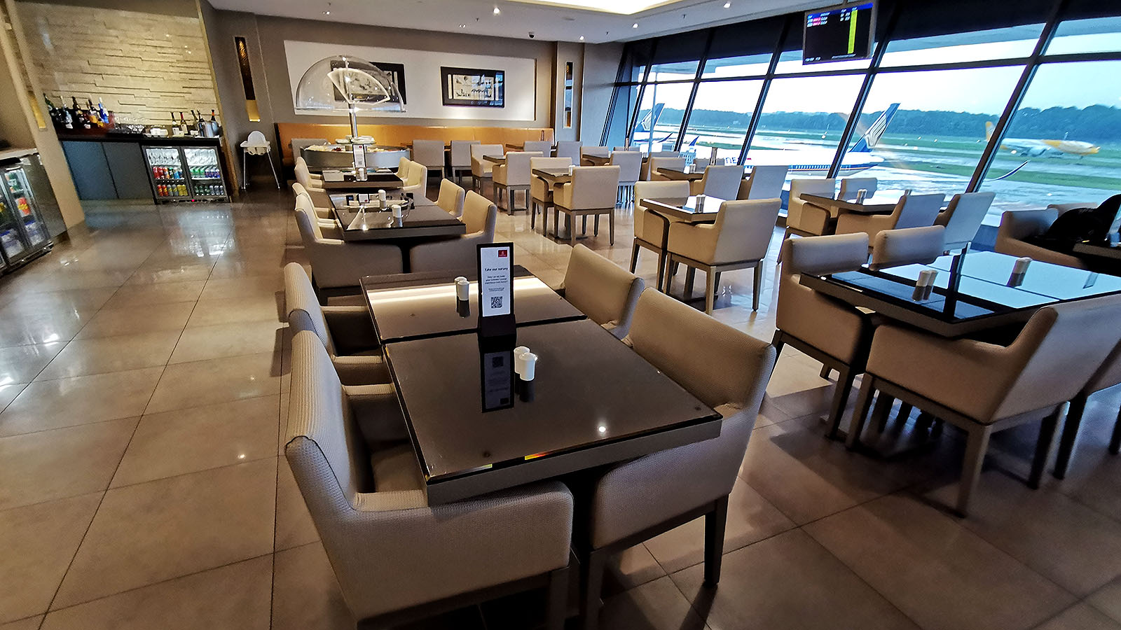 Dining tables and chairs at the Emirates Lounge, Singapore