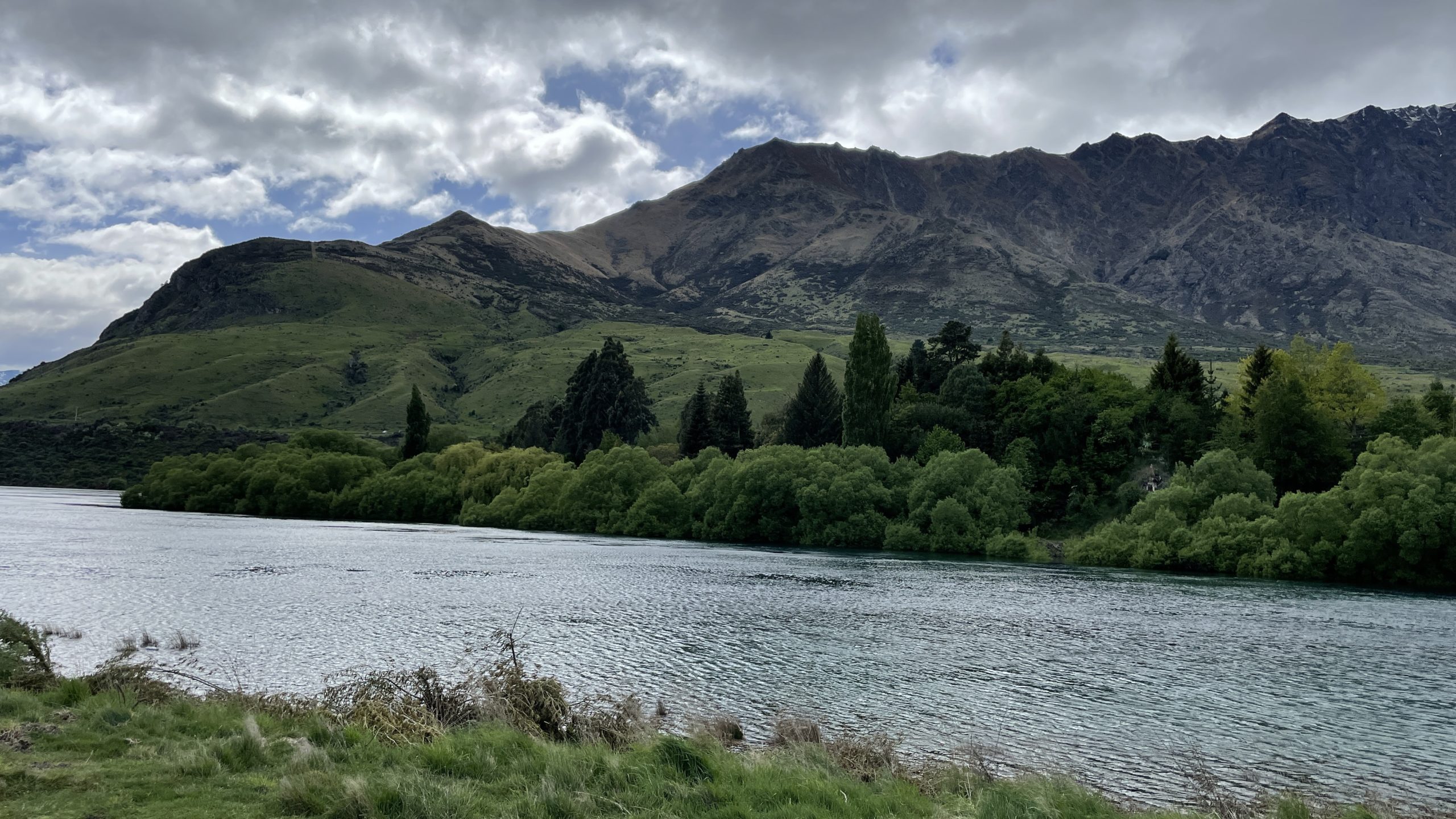 Queenstown mountains green hills water