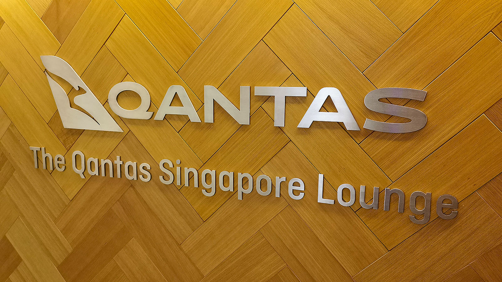 Qantas logo at the Qantas International Business Lounge in Singapore