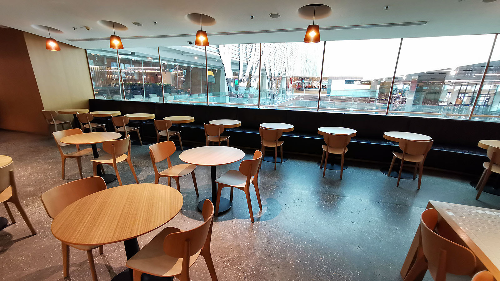 Dining tables at the Qantas International Business Lounge in Singapore