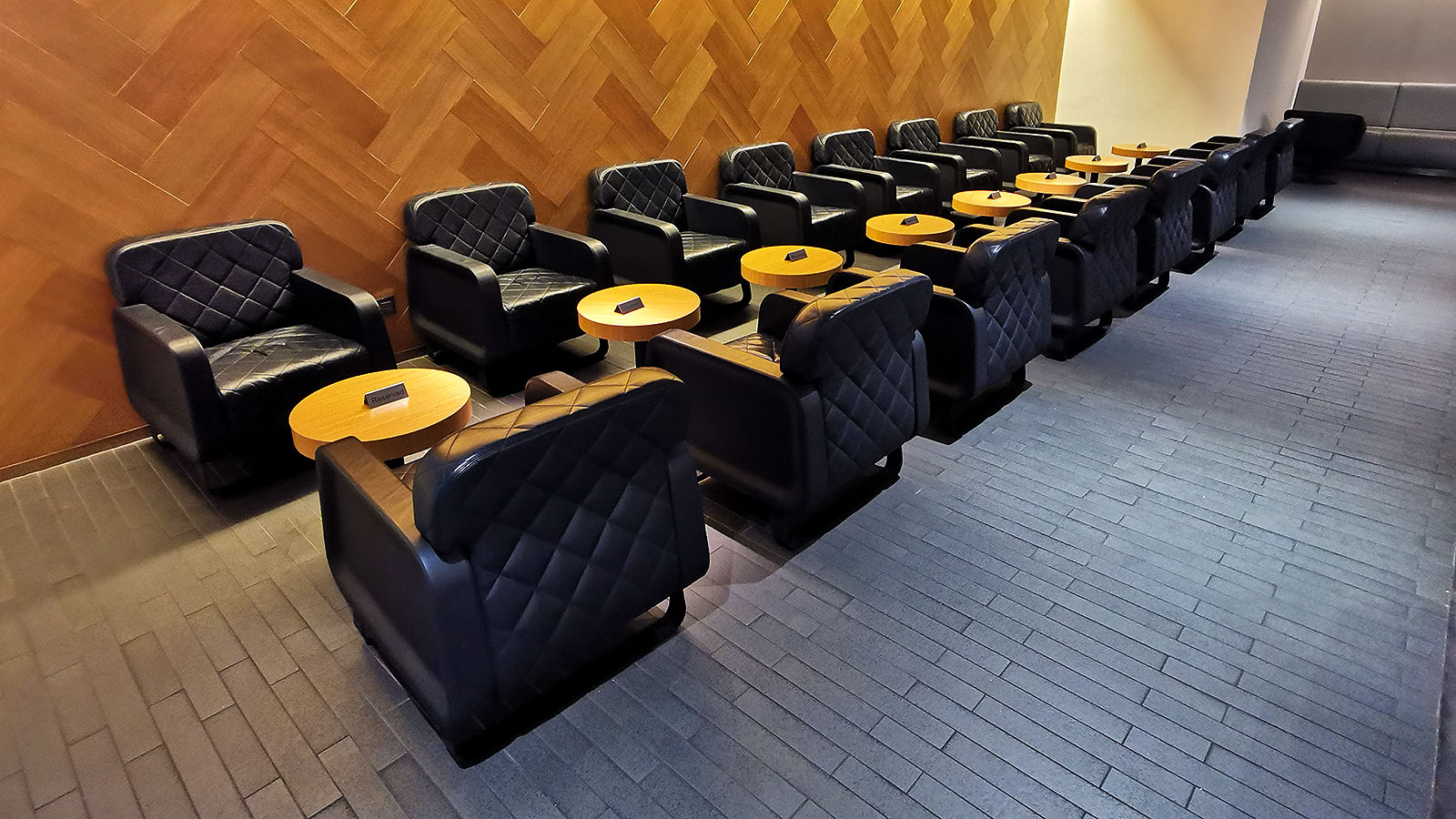 Reserved signs on tables at the Qantas International Business Lounge in Singapore