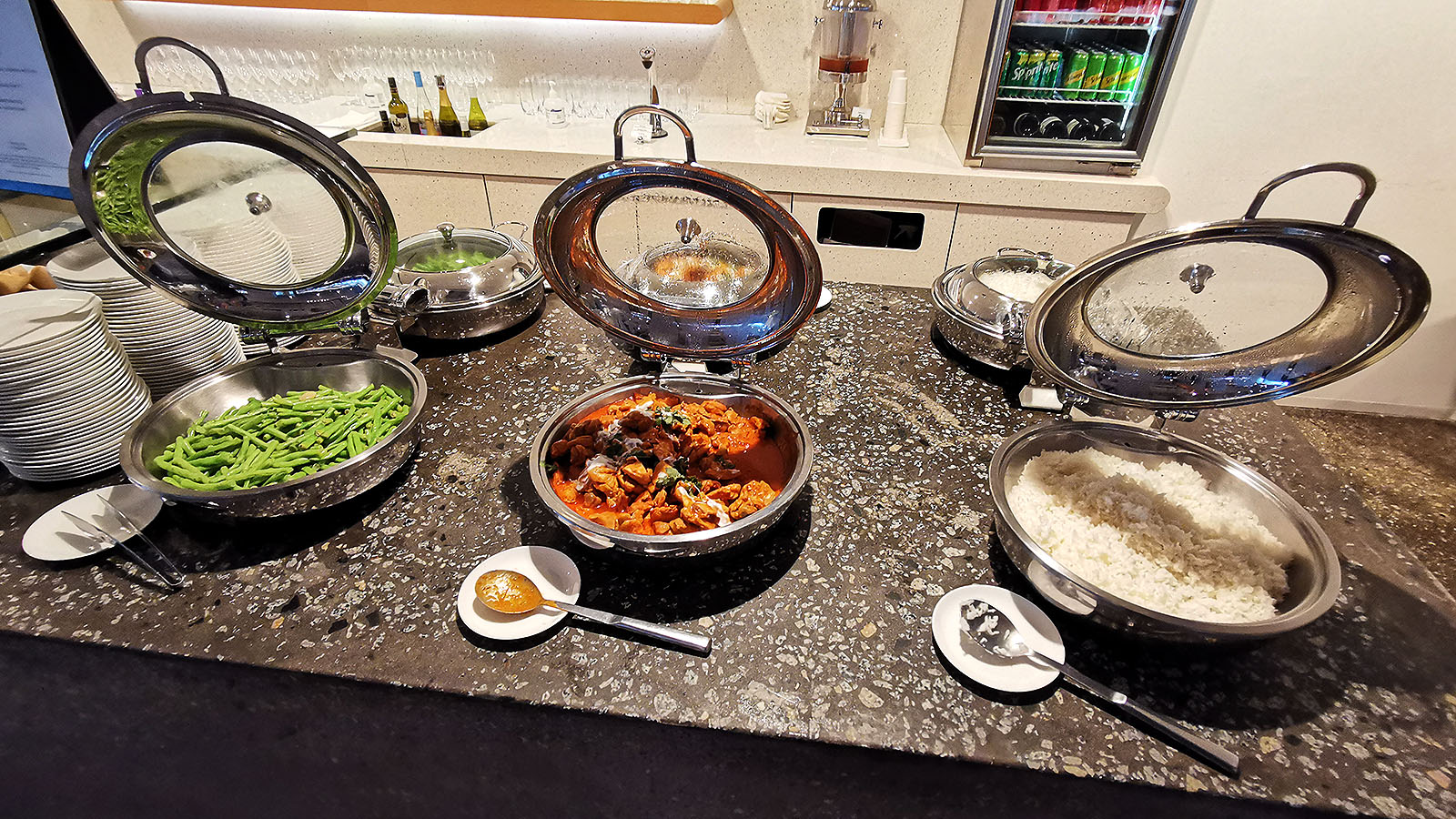 Hot buffet items at the Qantas International Business Lounge in Singapore