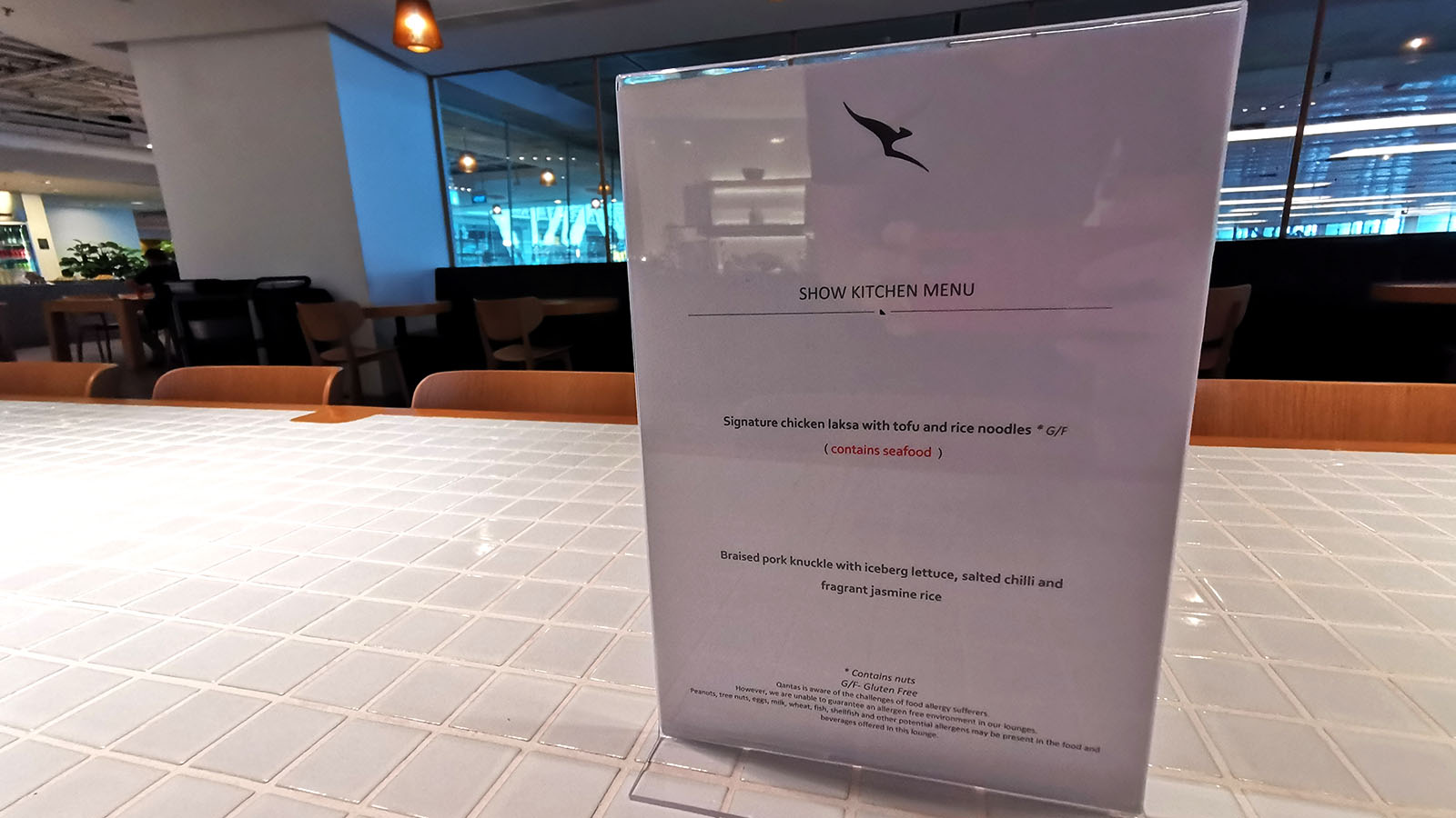Show kitchen dining menu at the Qantas International Business Lounge in Singapore