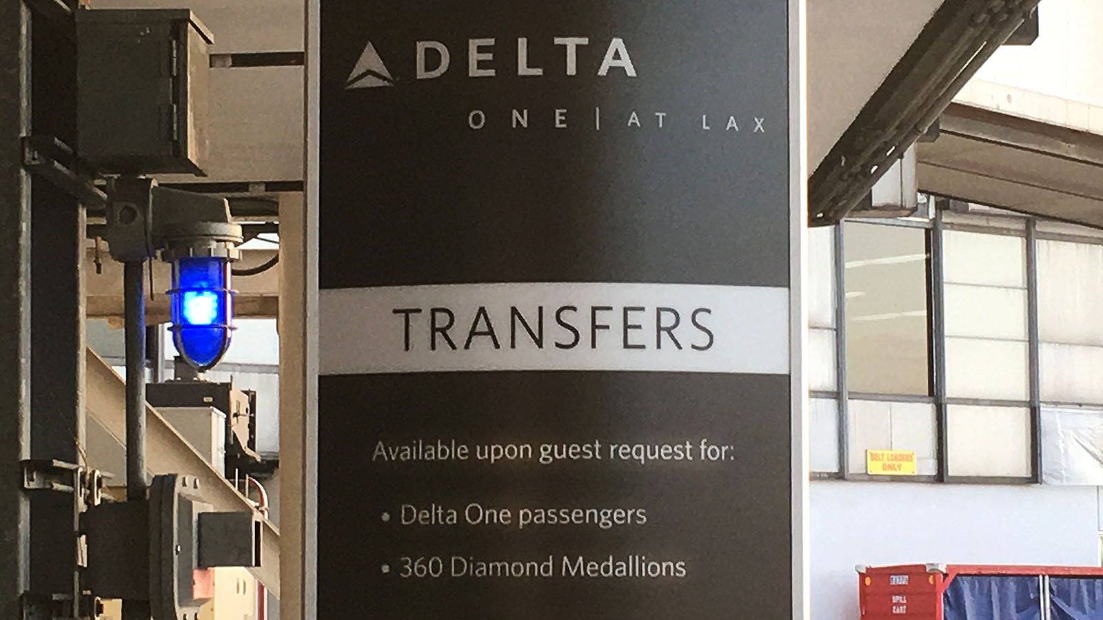 Delta airport transfer sign for 360° Diamond Medallion members.