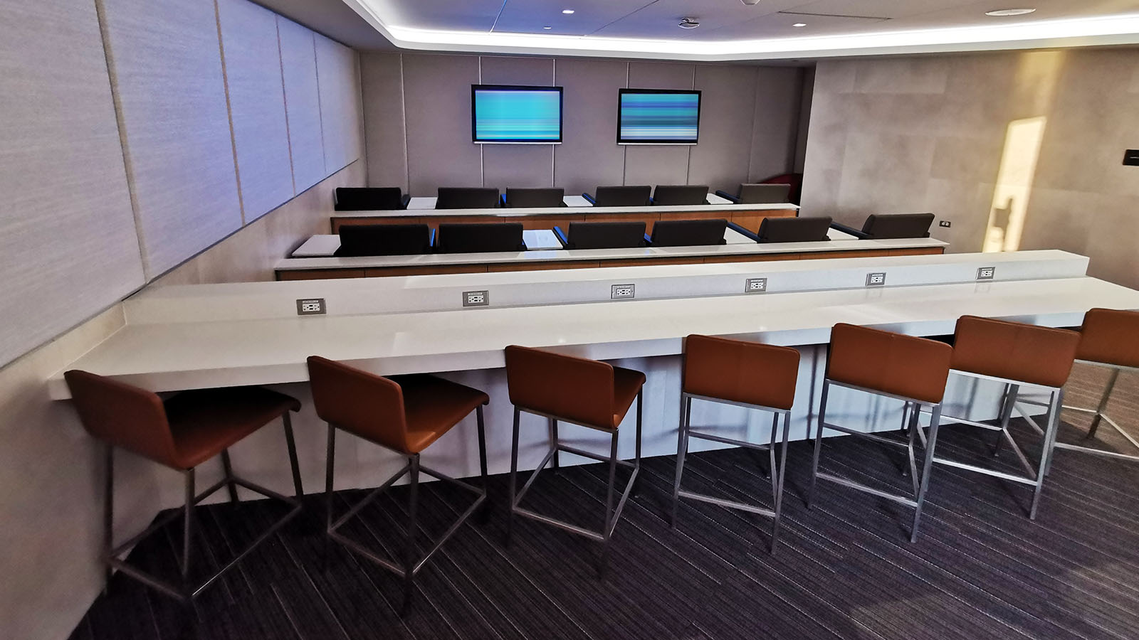 TV room and work bench at AA's Flagship Lounge in Chicago