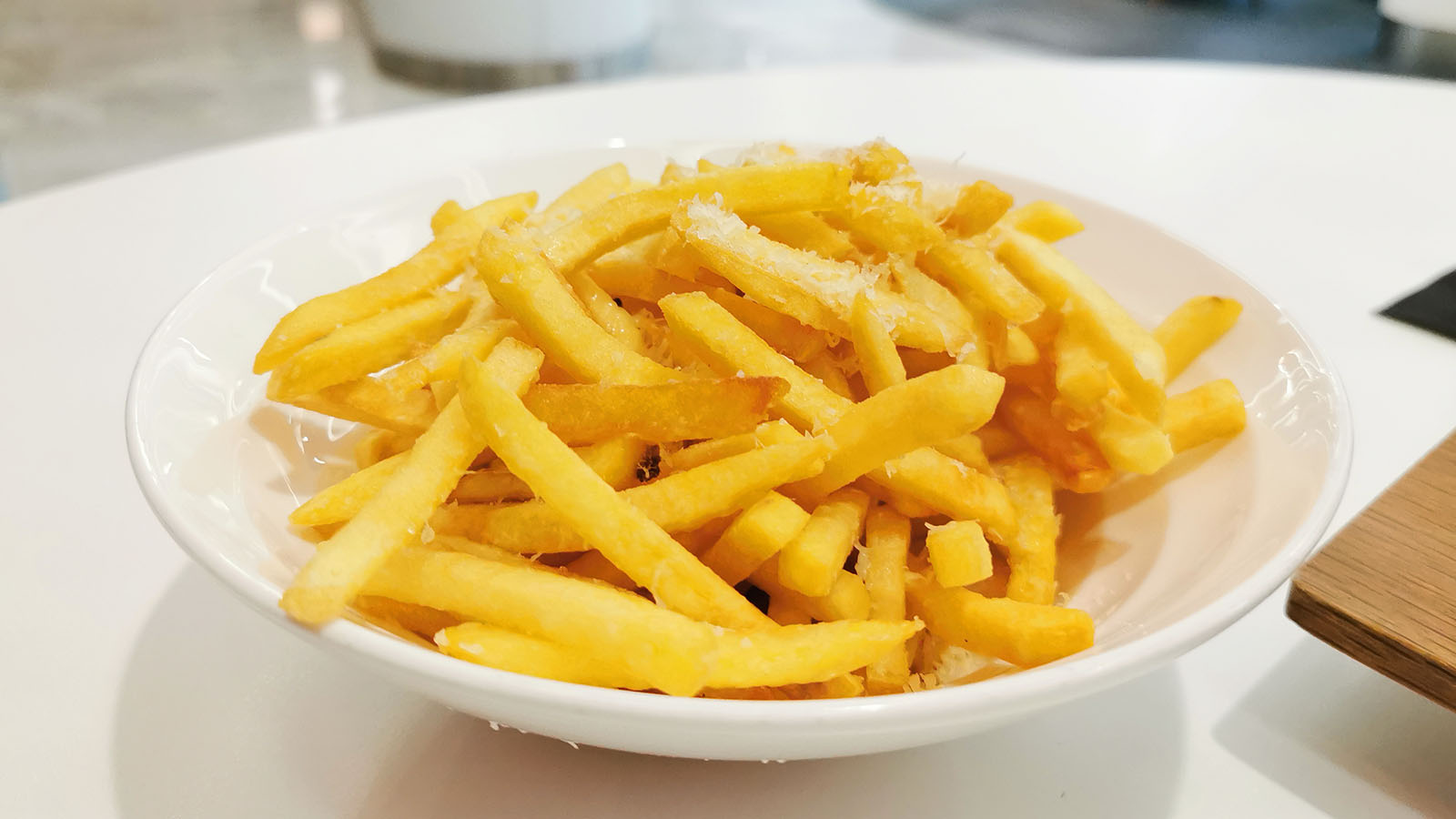 Parmesan truffled fries at Virgin Australia Beyond Lounge in Brisbane