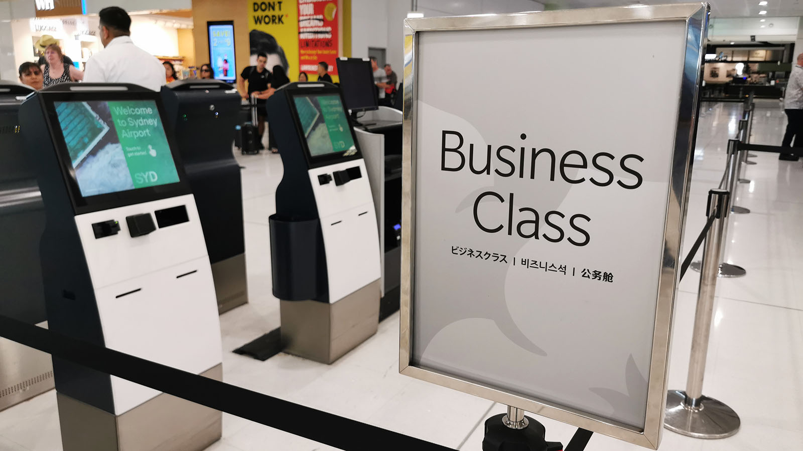 Business Class check-in sign at Sydney Airport for a Hawaiian Airlines Airbus A330 Business Class flight