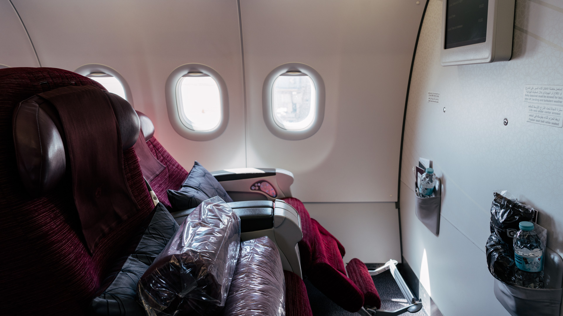 Qatar airways cheap bassinet size