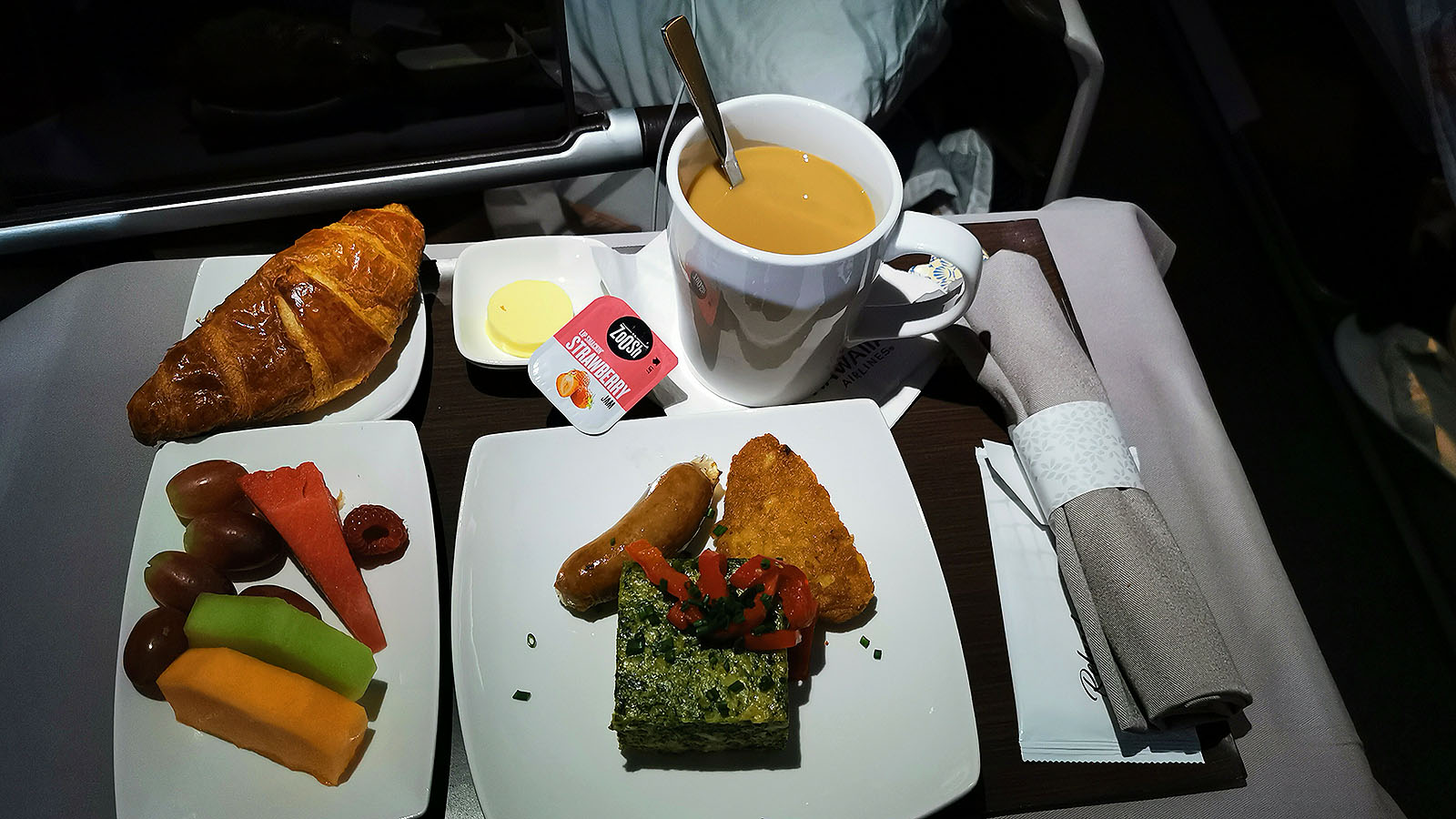 Frittata and coffee in Hawaiian Airlines Business Class
