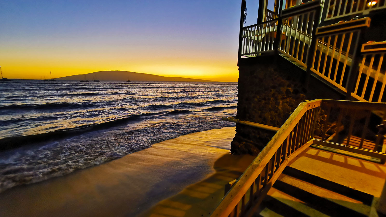 Sun behind Lahaina Harbor in Hawaii