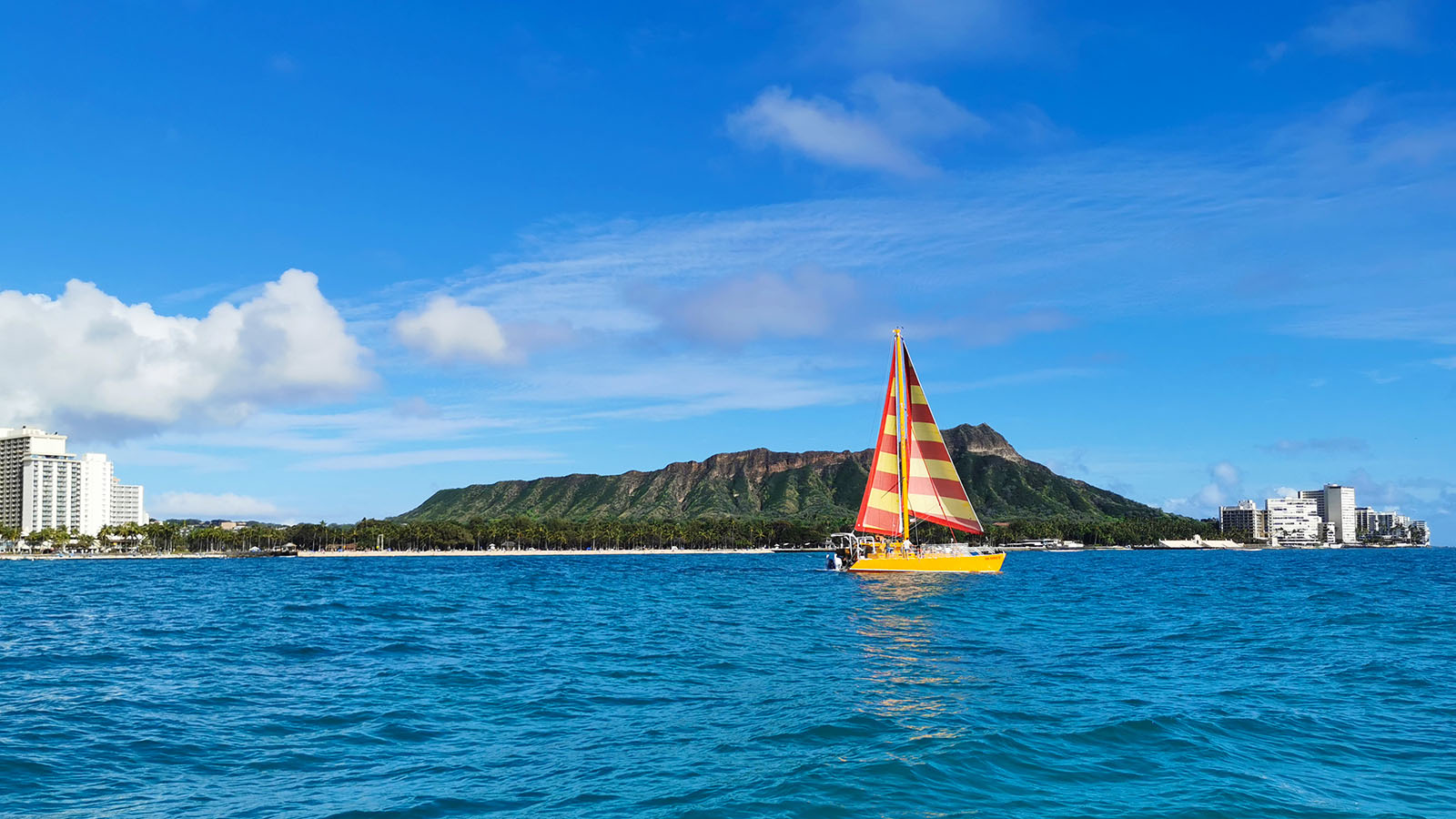 Sailboat in front of Diamond Head