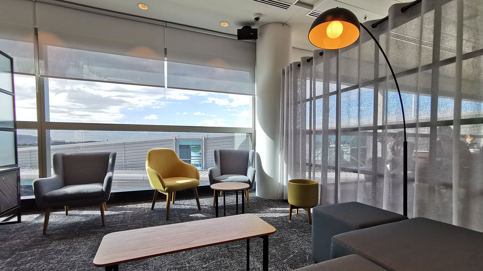 Seating with a window view at Brisbane's Aspire Lounge