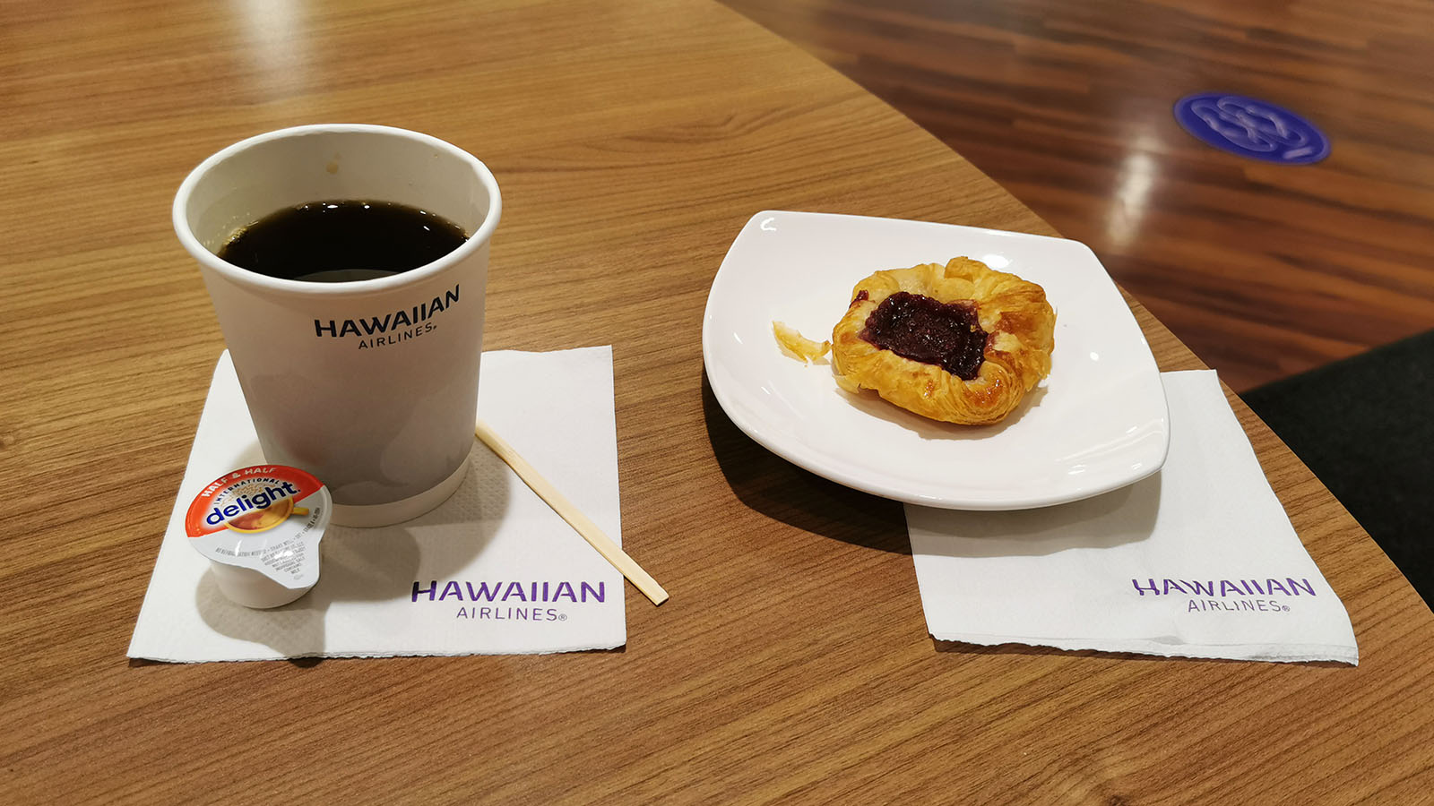 Coffee and pastry in the Hawaiian Airlines lounge