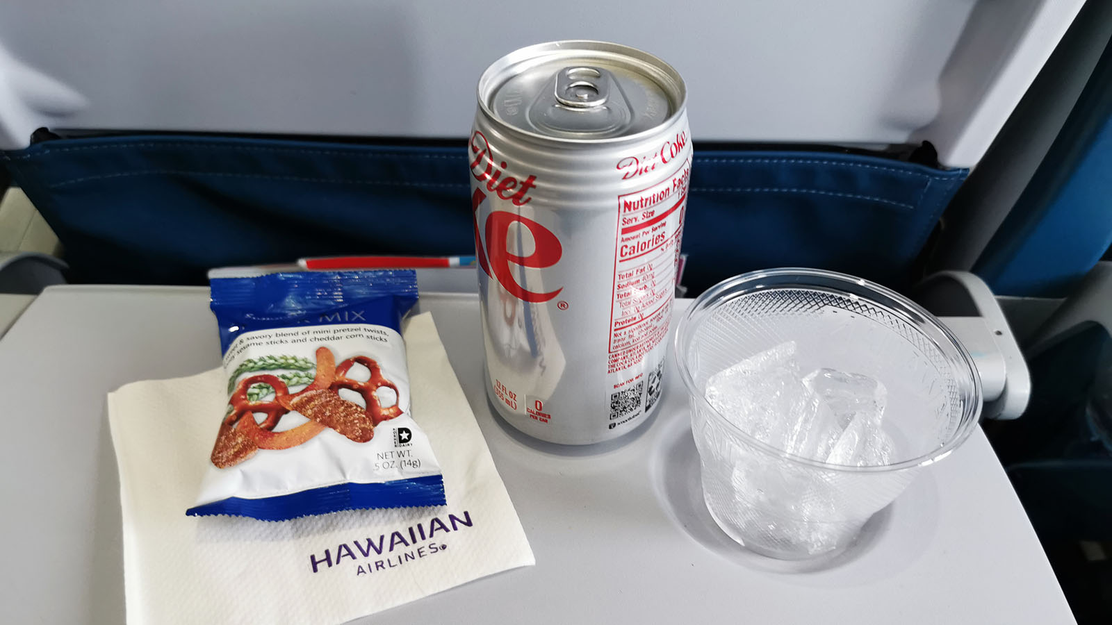 Soft drink and pretzels in Economy on Hawaiian Airlines