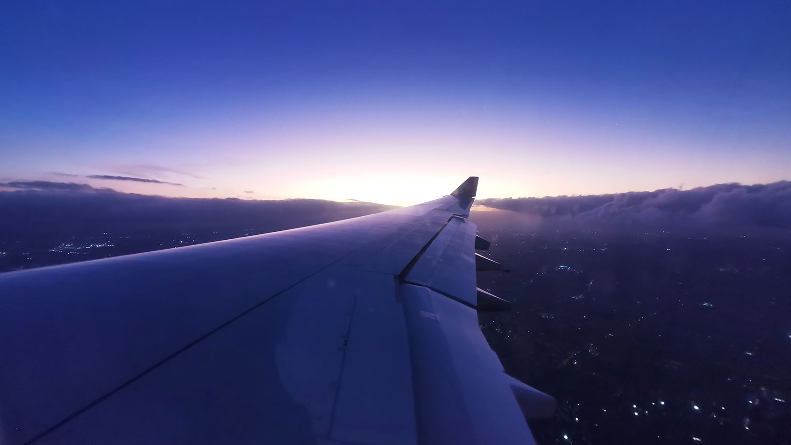 Sunset seen in Economy on Hawaiian Airlines