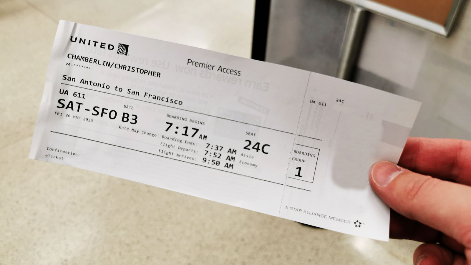 Boarding pass for United Airlines with group 1 boarding