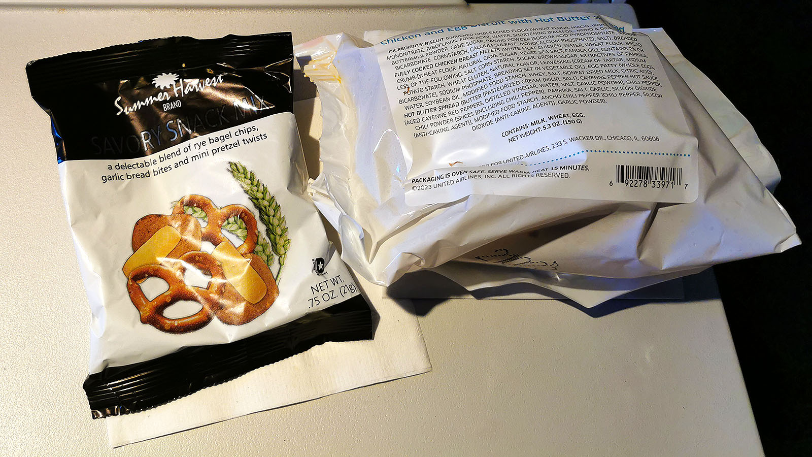 Pretzels and menu item purchased on a United Airlines Airbus A319 flight