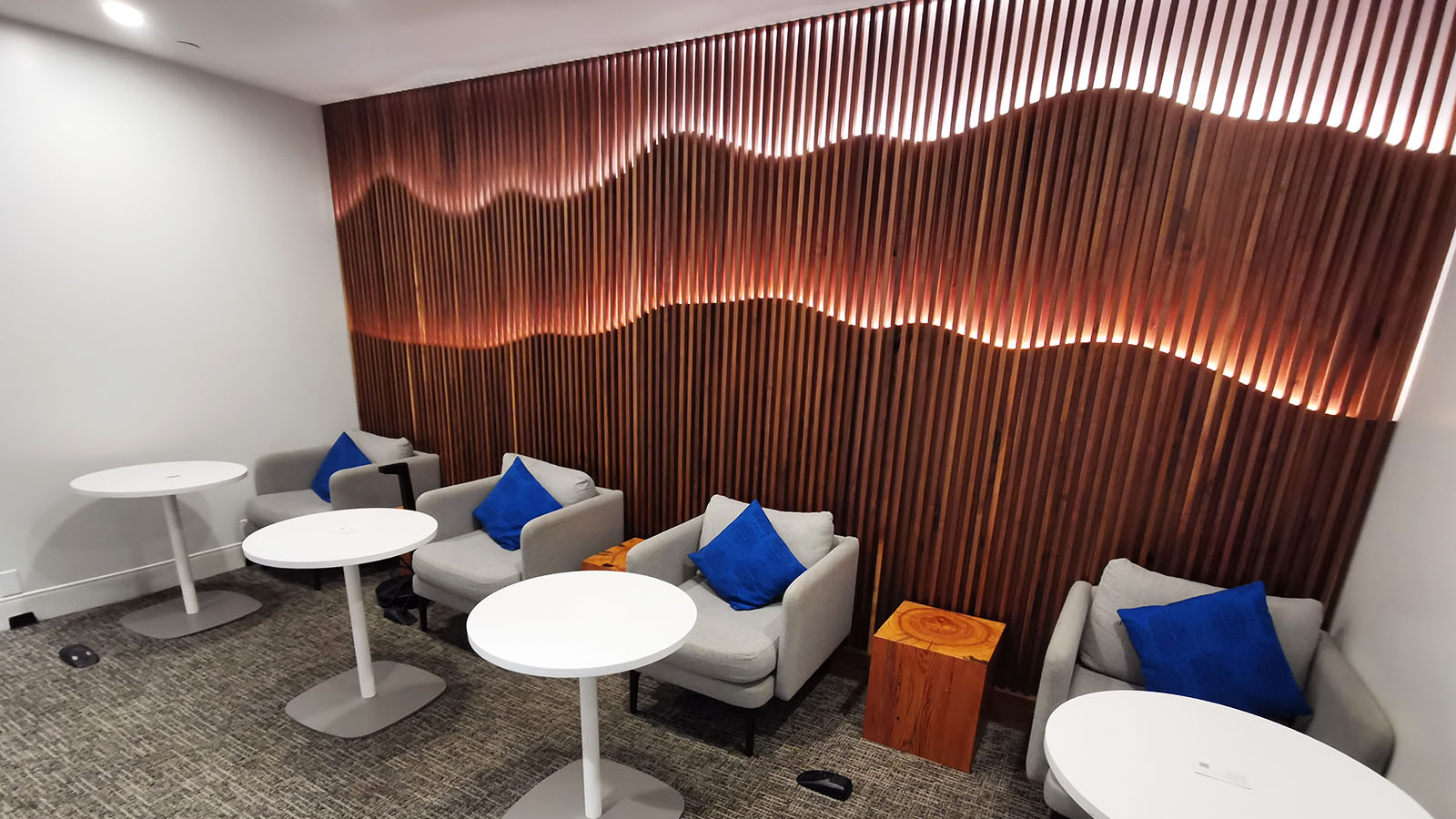 Chairs and tables at the Amex Centurion Lounge in Los Angeles