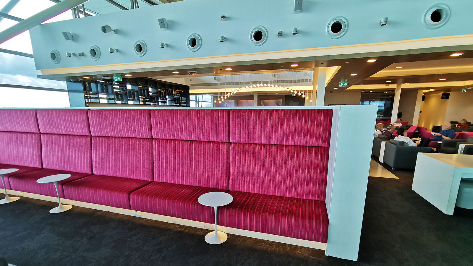 Fushia banquette chair at the Air New Zealand Business Premier lounge in Brisbane