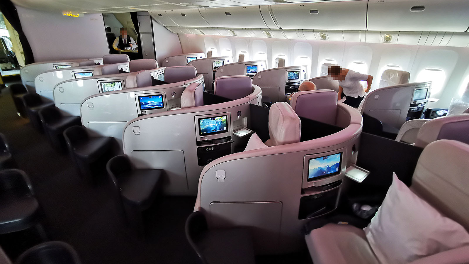 Couple seating in Air New Zealand Boeing 777 Business Premier