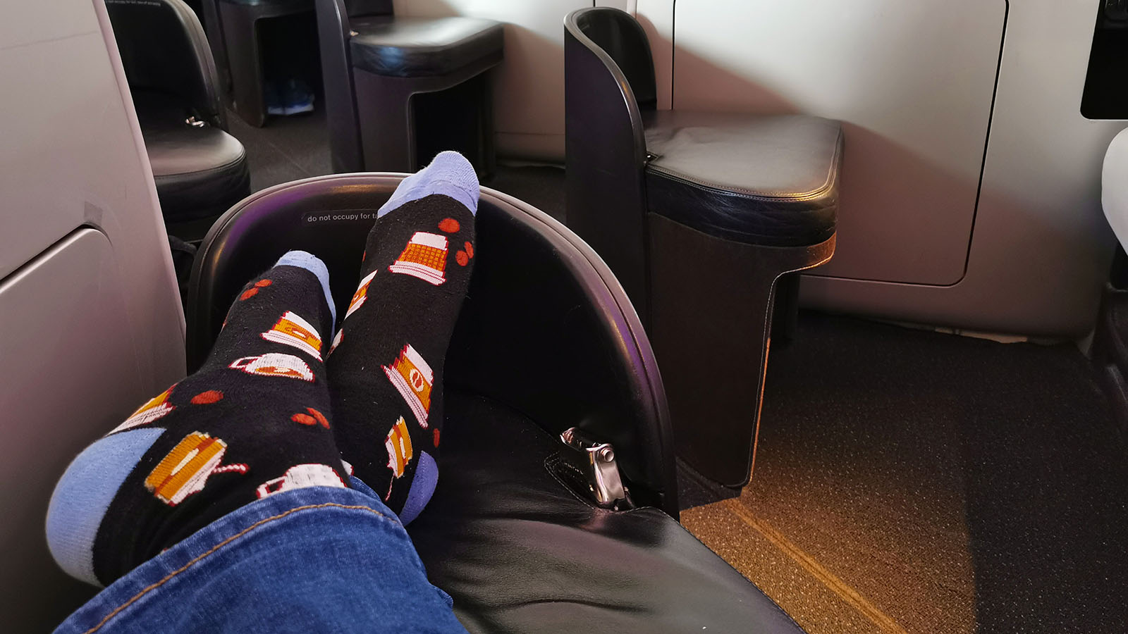 Colourful socks in Air New Zealand Boeing 777 Business Premier