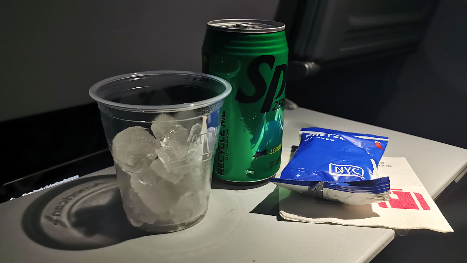 Drink and snack in American Airlines Boeing 737 Economy