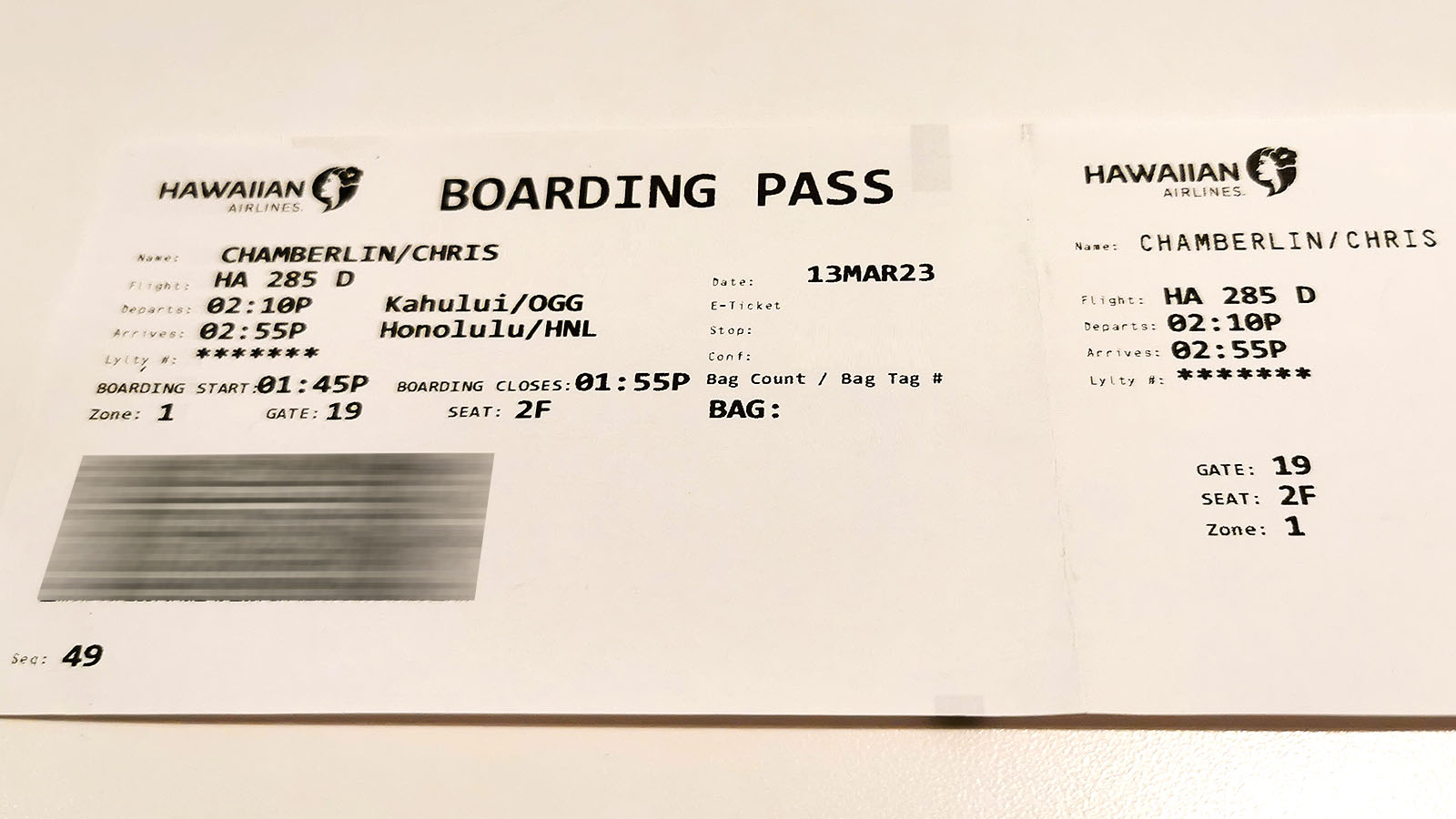 Paper boarding pass on Hawaiian Airlines